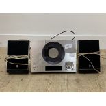 A Yamaha CRX-TS20 CD player, complete with a pair of Yamaha speakers, power lead and remote (