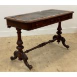 A Victorian mahogany library table, the skivered top (A/F) over two frieze drawers, raised on leaf