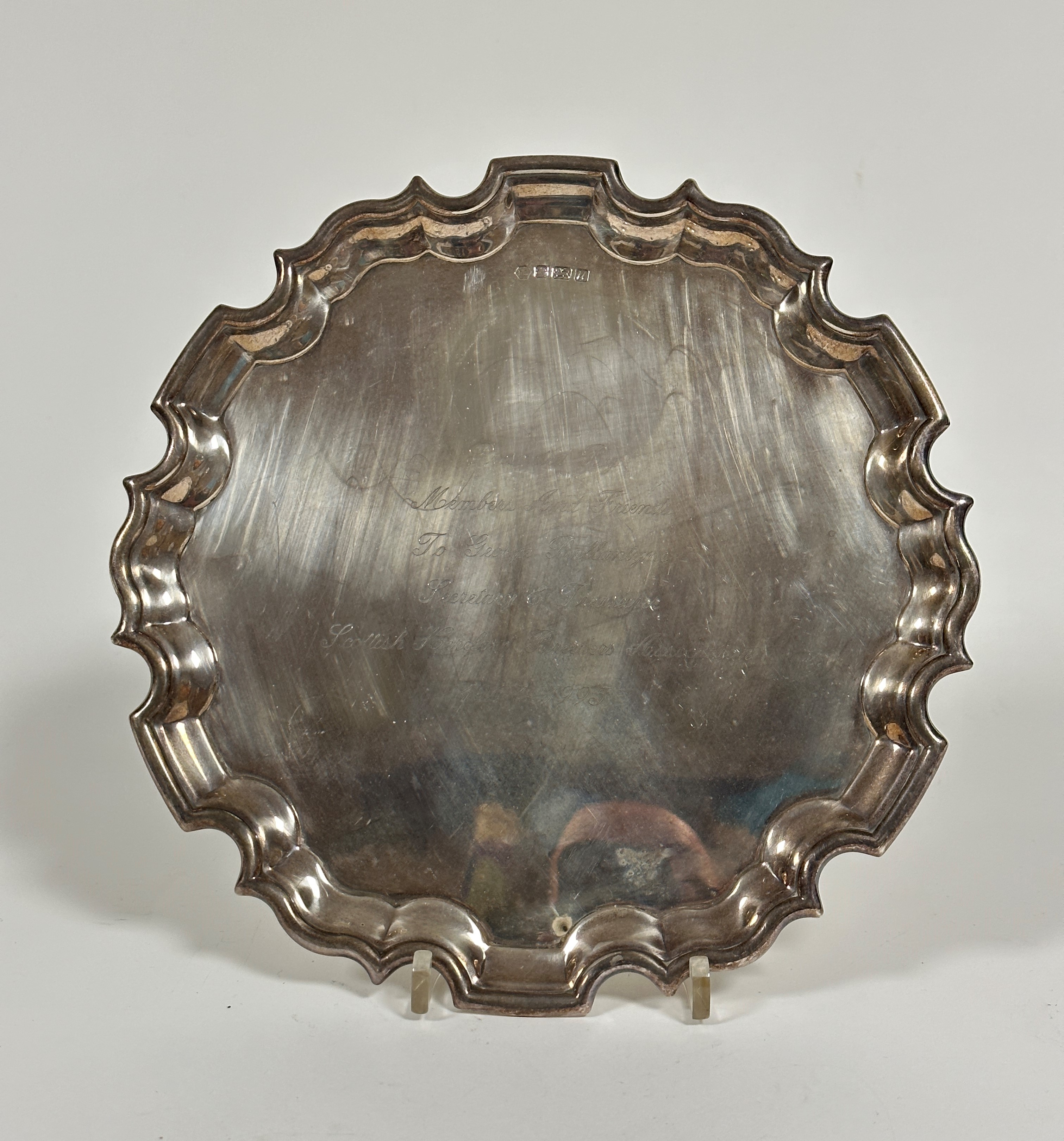 A modern silver scalloped waiter presented by Members and Friends to George Ballantyne, Secretary