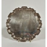 A modern silver scalloped waiter presented by Members and Friends to George Ballantyne, Secretary