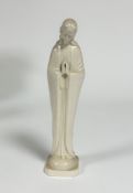 A Hummel pottery blanc de chine figure, Madonna, with hands held in prayer, on square moulded