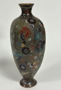 A Japanese Meji period Kyotojippo style cloisonne octagonal baluster vase, decorated with circular