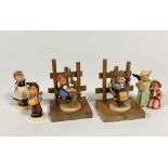 A pair of Hummel treen fence bookends with Apple Tree Boy and Apple Tree Girl (13cm), three