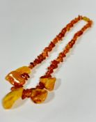 A Baltic butterscotch amber nugget necklace. 22cm