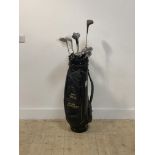 A partial set of Dunlop golf clubs, together with eight other golf clubs by various makers (15) in a