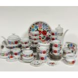 A sixty one piece Hungarian Kolocsa tea, coffee and serving set, including six tea cups, six