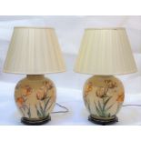 A pair of Jenny Worrall large hand-blown glass table lamps decorated with hand cut tulips on a