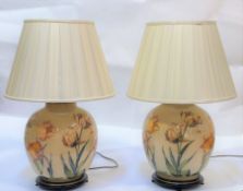 A pair of Jenny Worrall large hand-blown glass table lamps decorated with hand cut tulips on a
