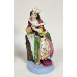 A 19thc Continental porcelain figure, Lady in Courtly Dress, with polychrome and gilt decoration, on