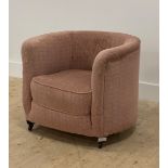 An early to mid 20th century upholstered tub chair moving on castors. H60cm, W72cm