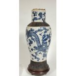 A large Chinese blue and white crackle glaze pottery baluster vase, the foot and shoulder with