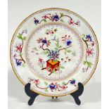 A Royal Worcester Indian Tree Peony pattern plate with polychrome enamels depicting peonies in a