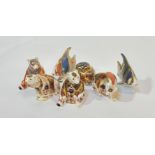 A collection of Royal Crown Derby fine bone paperweights comprising a Honey Bear (h- 11cm), a