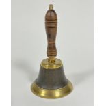 An Edwardian brass ash handled turned school bell, with turned knop and patinated centre panel (25cm