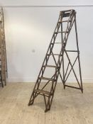 A set of early 20th century pine 7 rung decorators step ladders, stamped 'Eller brand made in