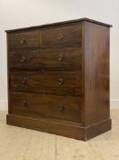 An early 20th century inlaid mahogany chest, fitted with two short and three long graduated drawers,