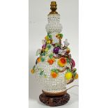 A large Meissen marked Schneeballen vase converted to a lamp base decorated with fruits and birds