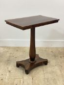 A William IV rosewood sidetable, the rectangular top over a faceted octagonal column and
