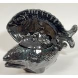A black glazed Aegitna Vallauris tureen (h- 25cm) and platter (w- 58cm) in the form of fish (