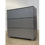 A stamped aluminium three drawer hanging filling cabinet, H102cm, W100cm, D45cm