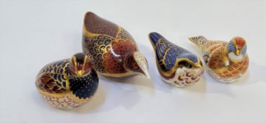 A group of Royal Crown Derby bone China paperweights comprising a Pheasant, a Nuthatch, a Linnet,