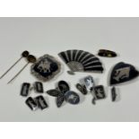 A collection of Thai sterling silver including fan shaped black enamelled brooch (4.5cm x 7cm), an
