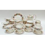 A Paragon China 'Country Lane' part tea/coffee service decorated with floral sprays and gilt