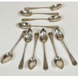 A set of six Sheffield silver Old English pattern coffee spoons and a set of four Sheffield silver