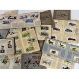 A collection of cigarette picture card albums comprising Motor Cars, Dogs, Sea Fishes, Life in the