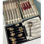 A set of six Epns table knives boxed, a set of six matching side knives boxed and a set of six