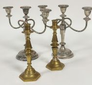 A pair of plated three branch candelabra on circular cast bases (29cm x 33cm x 12.5cm) and a pair of