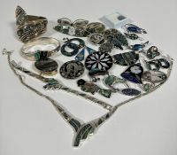 A collection of white metal and silver Abalone mounted jewellery including two pairs of circular