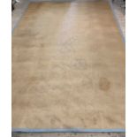 A Large jute carpet woven in a herringbone pattern (stained) 340cm x 546cm