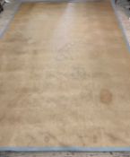 A Large jute carpet woven in a herringbone pattern (stained) 340cm x 546cm