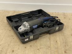 An Energer 230mm corded angle grinder, complete with hard case and six cutting disks