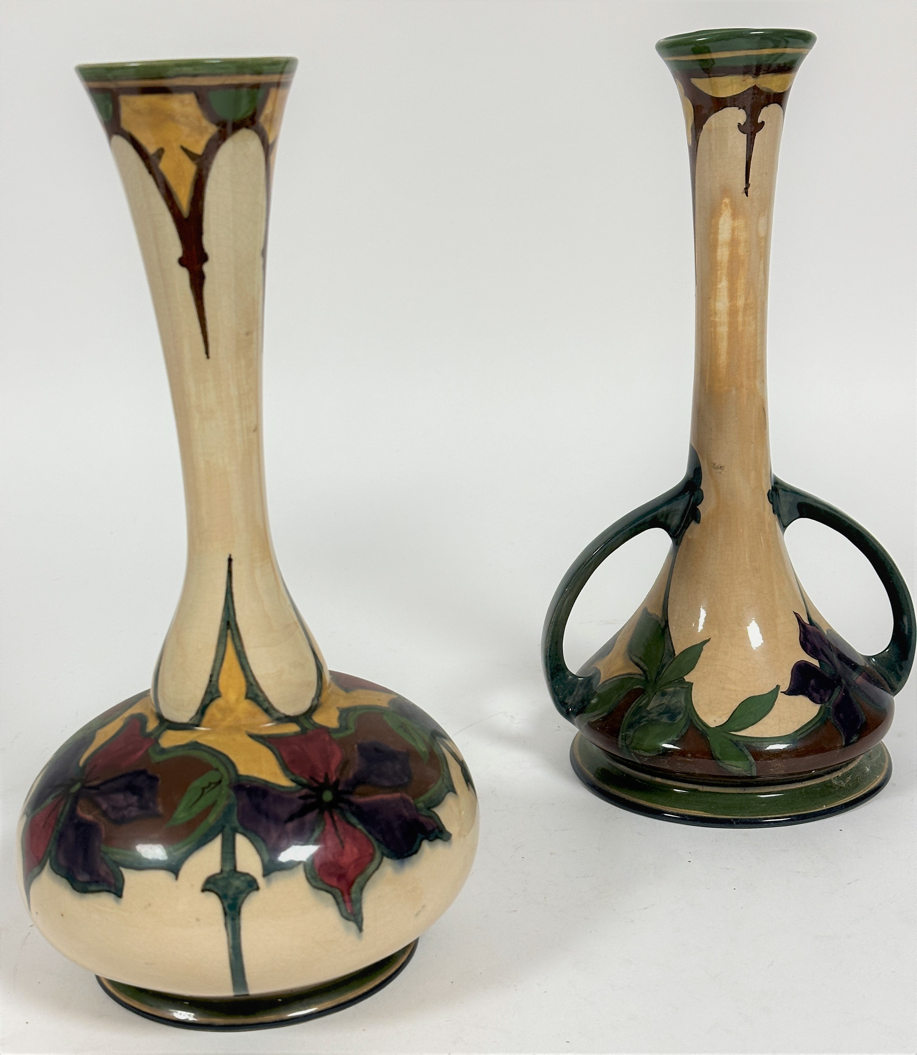 A Dutch 1920's Gouda style pottery flared neck bottle vase decorated with hand painted Clematis - Image 3 of 6