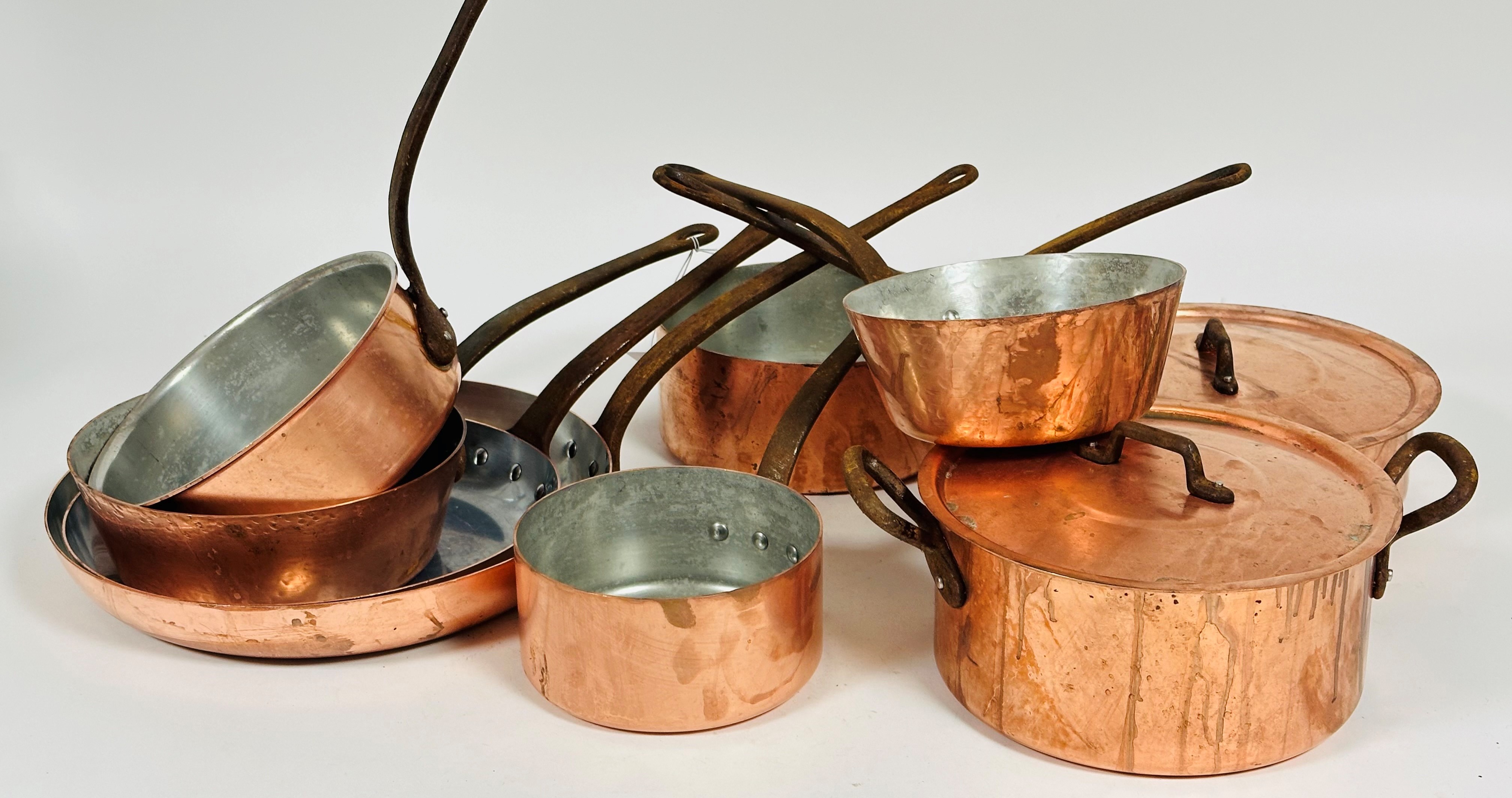 A Collection of French Baumalu copper zinc lined cookware including, two skillets ( d 32.5cm , 28cm)