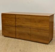 A contemporary walnut veneered hanging filling cabinet, fitted with six drawers (soft close