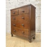 A Victorian mahogany chest, fitted with two short and three long graduated drawers, raised on turned