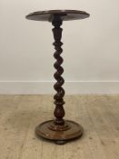 A Victorian mahogany pedestal table, the circular dished top over spiral turned column and