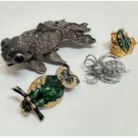 A white metal articulated shubunkin with marcasite and inset bead eyes formed as a brooch, an