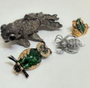 A white metal articulated shubunkin with marcasite and inset bead eyes formed as a brooch, an