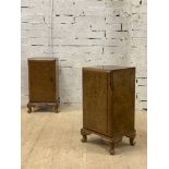 A pair of burr walnut bedside cabinets, circa 1930's, each with single door enclosing a shelf,