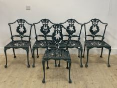 A set of five green painted floral cast aluminium garden chairs in the Rococo style H85cm, W50cm,