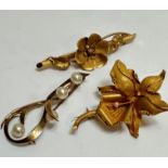 An Eastern yellow metal Orchid brooch set cultured pearl, a yellow metal floral bar brooch on