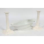 A pair of Hartley Greens & Co Leeds pottery cream ware square fluted tapered candle sticks, ( h 24cm