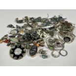 A collection of Abalone mounted white metal and silver jewellery including, circular and drop