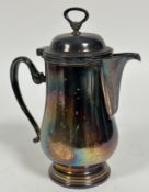 A large Epns water jug of baluster form with domed ring top cover and C scroll handle to side. (28cm