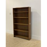 A 1940's oak five height floor standing open bookcase H128cm, W80cm, D16cm