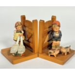 A pair of Hummel treen panel fence book ends with pigletts and geese stamped to side with bee and V.